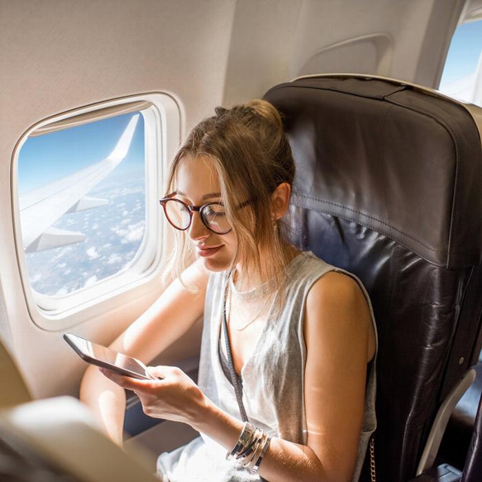 Woman sitting on plane
